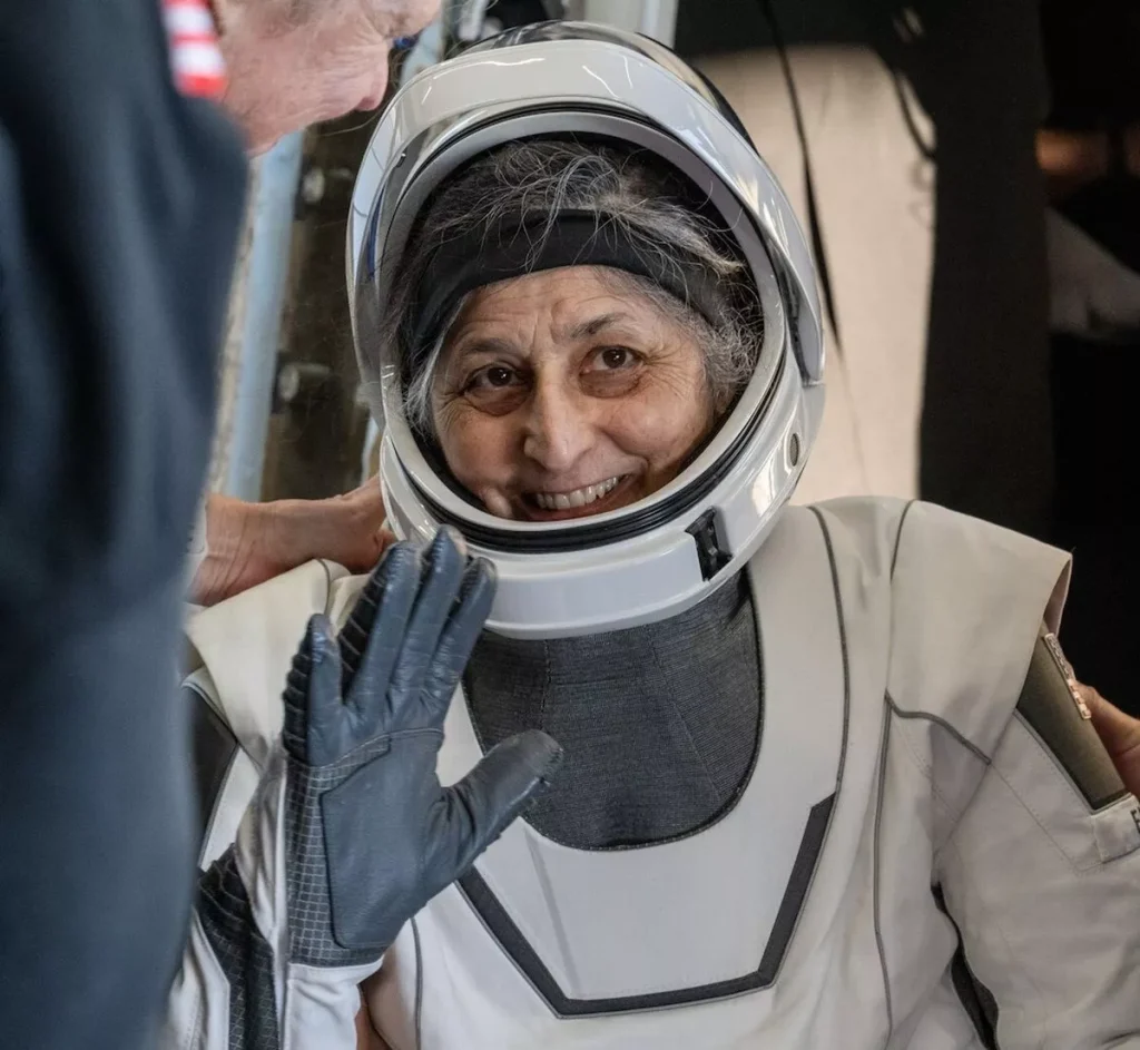 Suni Williams made it off the space shuttle and was helped onto a stretcher for a medican exam