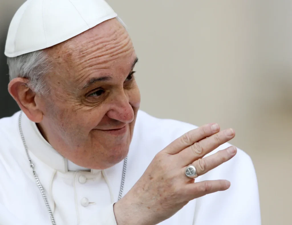 Pope Francis, pictured here at St. Peter's Square at the Vatican, often opted for a smaller, less ornate silver ring dating from his time as a cardinal.