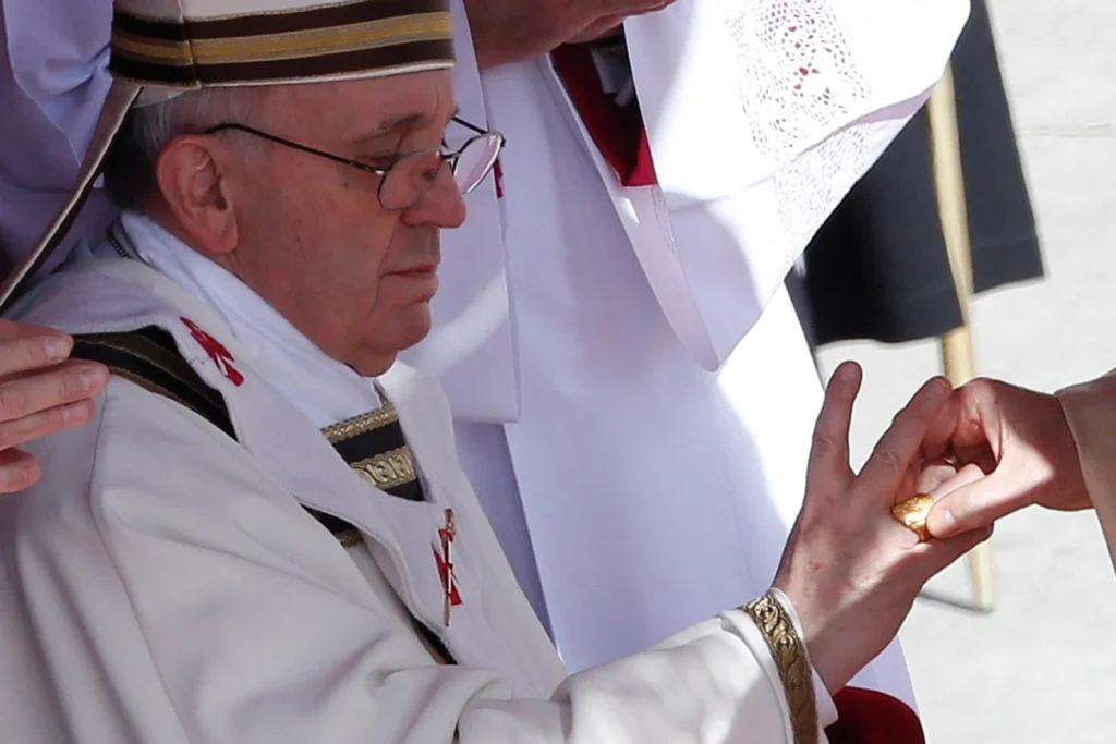 The Fisherman's Ring is placed on Pope Francis' finger during his inaugural mass at the Vatican on March 19, 2013